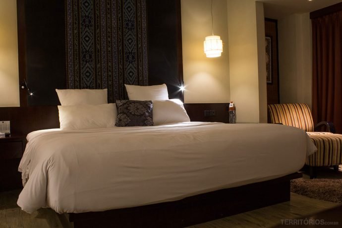 Cama king size na suíte deluxe