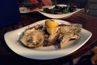 Ostras e mariscos para o jantar Ostras e mariscos para o jantar